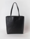 Georgia Tote in black apple leather. Back product image.