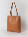 Georgia Tote in Cognac Apple Leather. Side product image.