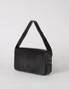 Black Baguette Leather womens handbag. Square shape with an adjustable strap. Side product image.
