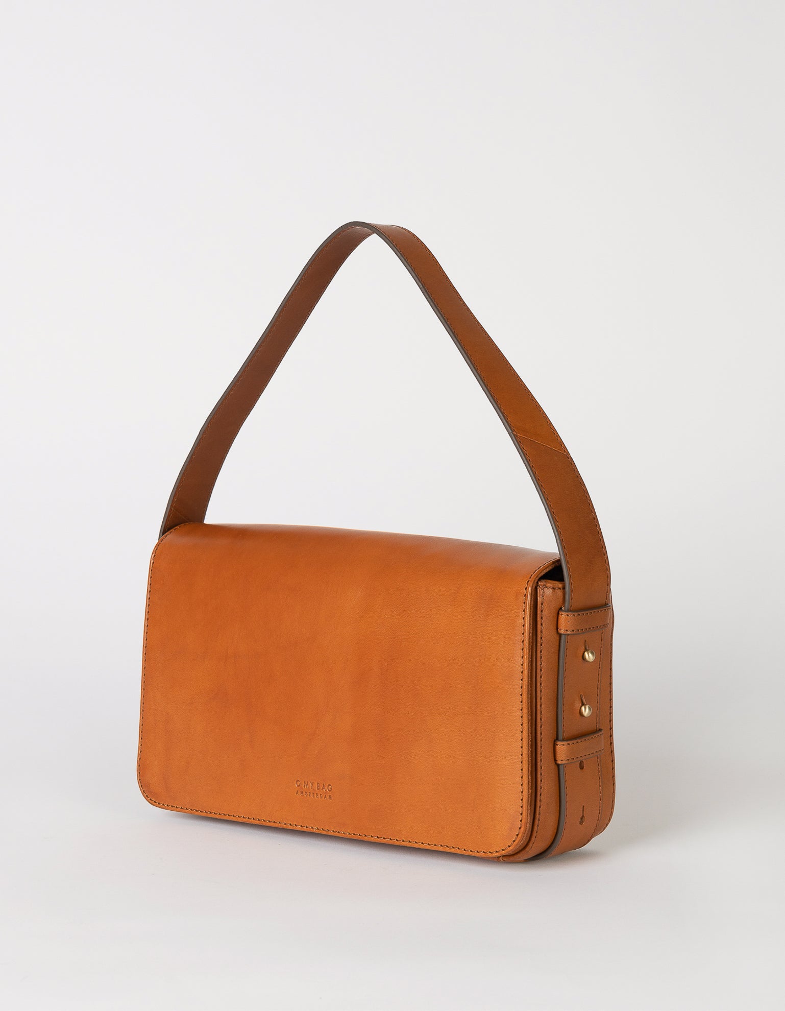 Cognac Baguette Leather womens handbag. Square shape with an adjustable strap. Side product image.