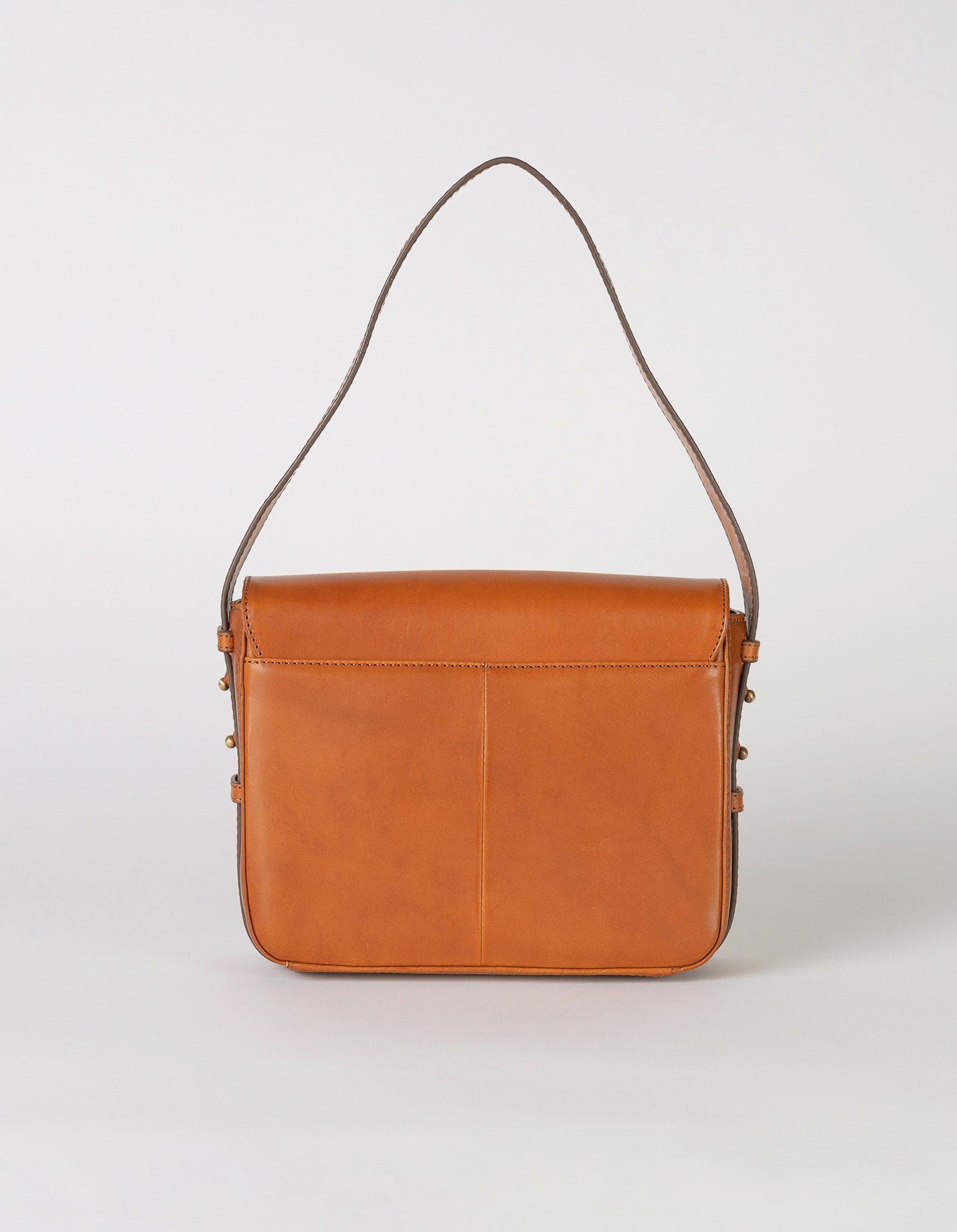 Cognac Leather womens handbag. Square shape with an adjustable strap. Back product image.