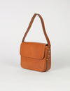 Cognac Leather womens handbag. Square shape with an adjustable strap. Side product image.