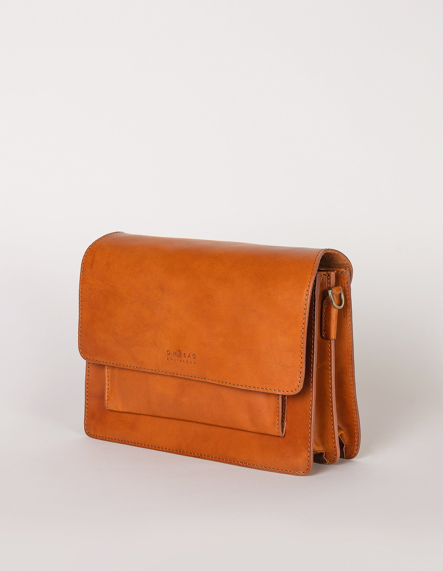 Harper Cognac Leather crossbody handbag. Side product image