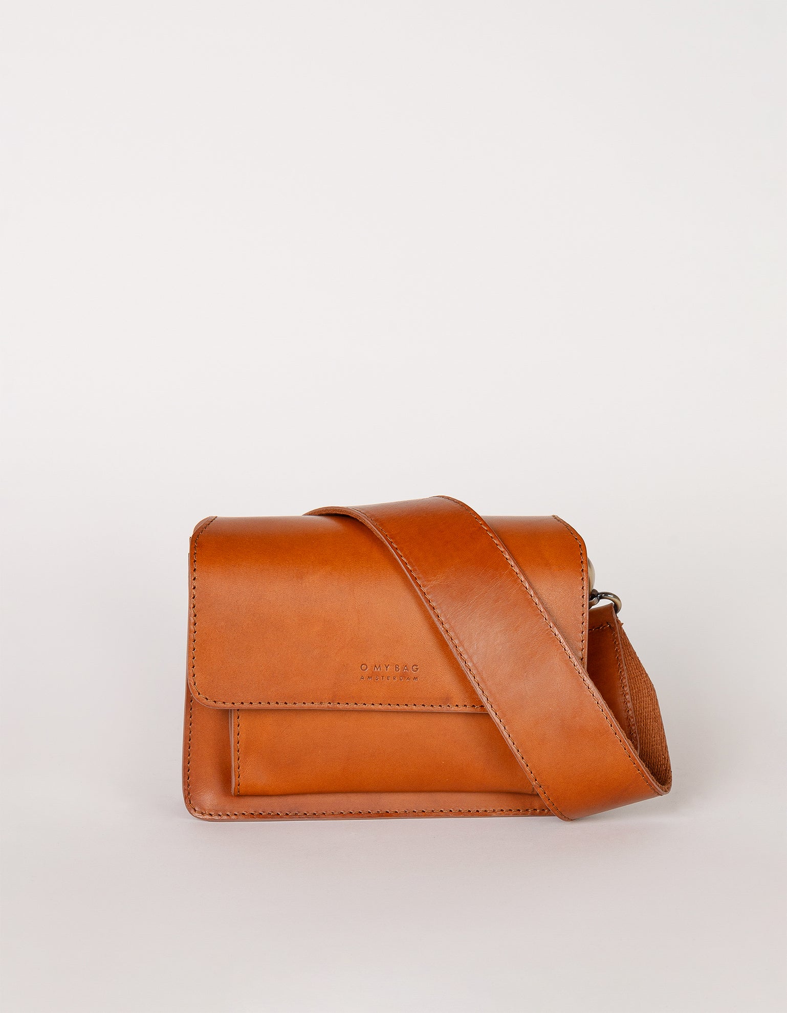 Harper Mini Cognac Leather crossbody handbag. Front product image