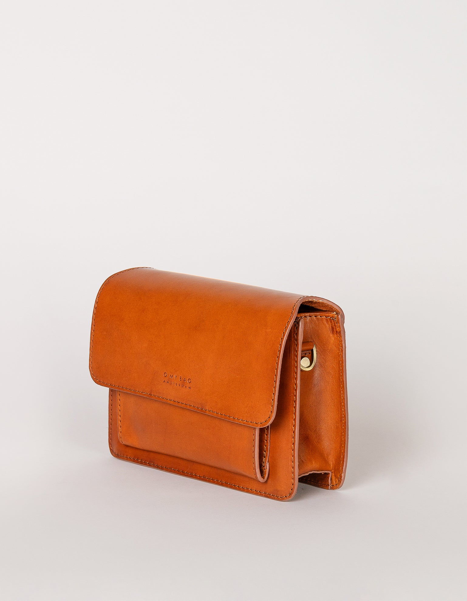 Harper Mini Cognac Leather crossbody handbag. Side product image