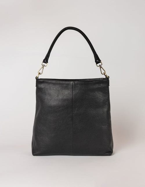 Black Leather shopper bag. Square shape with an adjustable and removable strap. Back product image.
