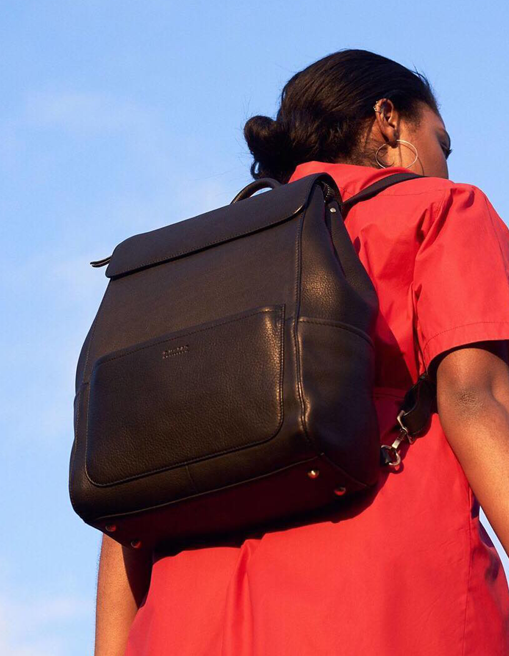 Black Leather backpack. Lifestyle product image.