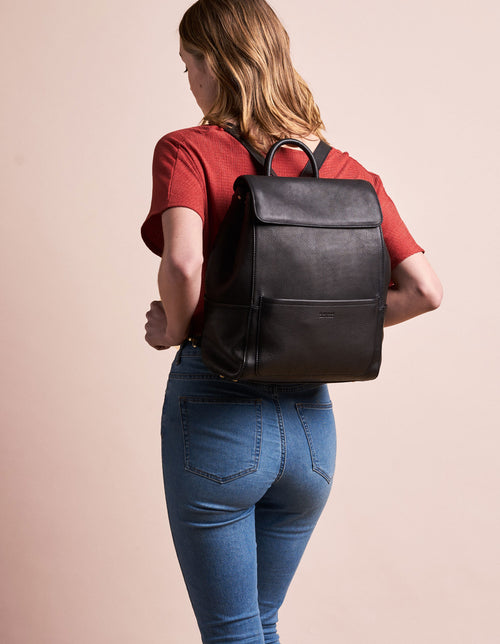 Black Leather backpack. Model product image.