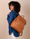 Jean Backpack in Wild Oak Soft Grain. Leather - Styled on a female model image