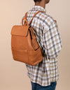 Jean Backpack in Wild Oak Soft Grain. Leather - Male model image from the back