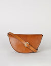 Laura Bag Cognac Classic Leather. Round moon shape crossbody bag . Front product image with full leather strap