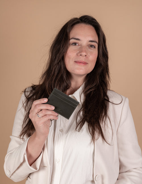 Marks Cardcase Green Soft Grain Leather. Square leather wallet, card case for bank cards. Model Image