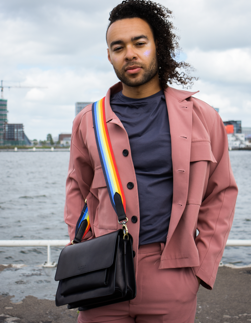Naz pride campaign. Featuring the rainbow webbing strap on the Harper bag.