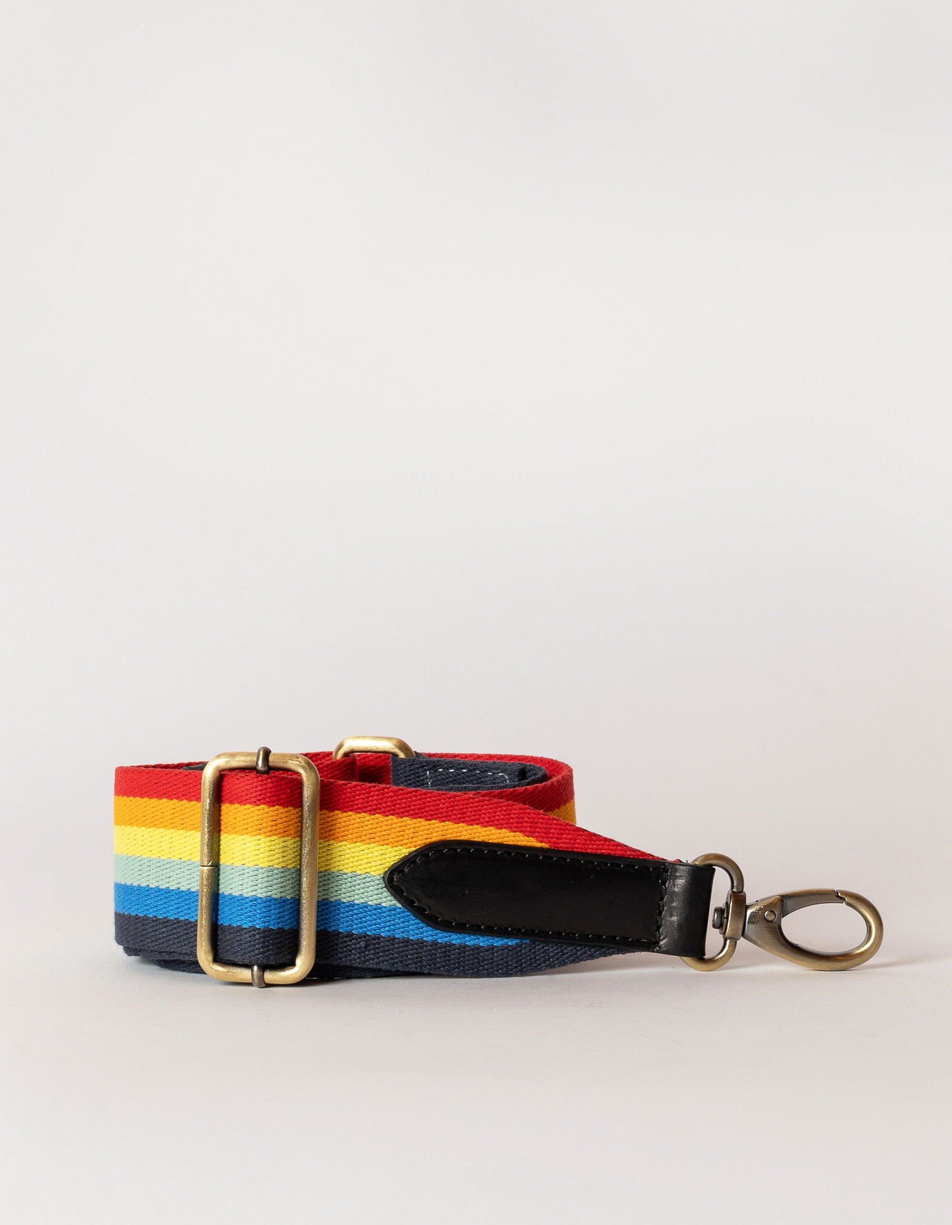 Rainbow webbing strap with black classic leather details.