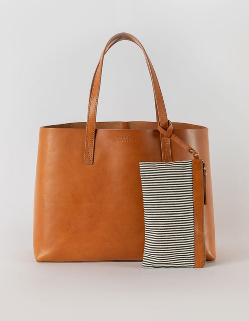 Sam Shopper - Cognac Classic Leather - Front product image with striped organic cotton pocket.