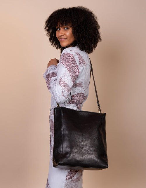 Sofia Black Leather Stromboli Leather - Long strap, female model image