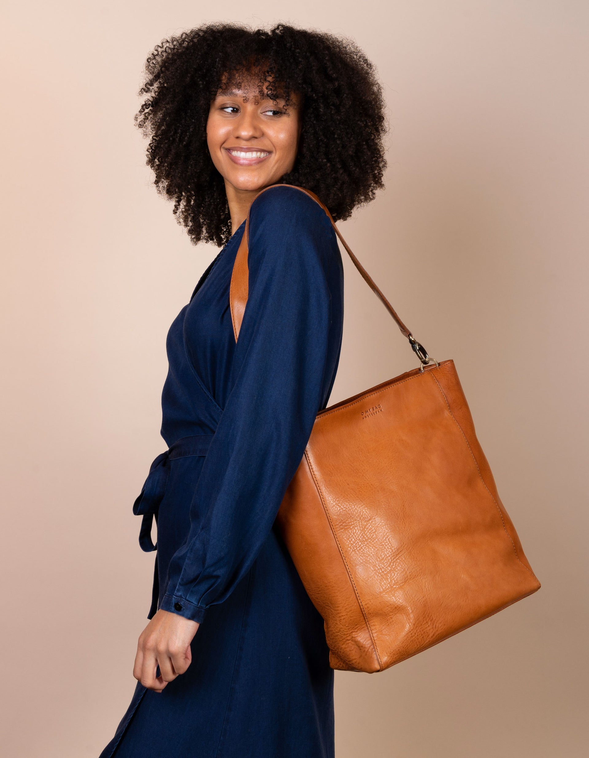 Sofia Cognac Leather Stromboli Leather, female model image