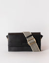 Stella in black classic leather with checkered strap. Front product image.