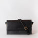 Stella in black classic leather with adjustable leather strap. Front product image.