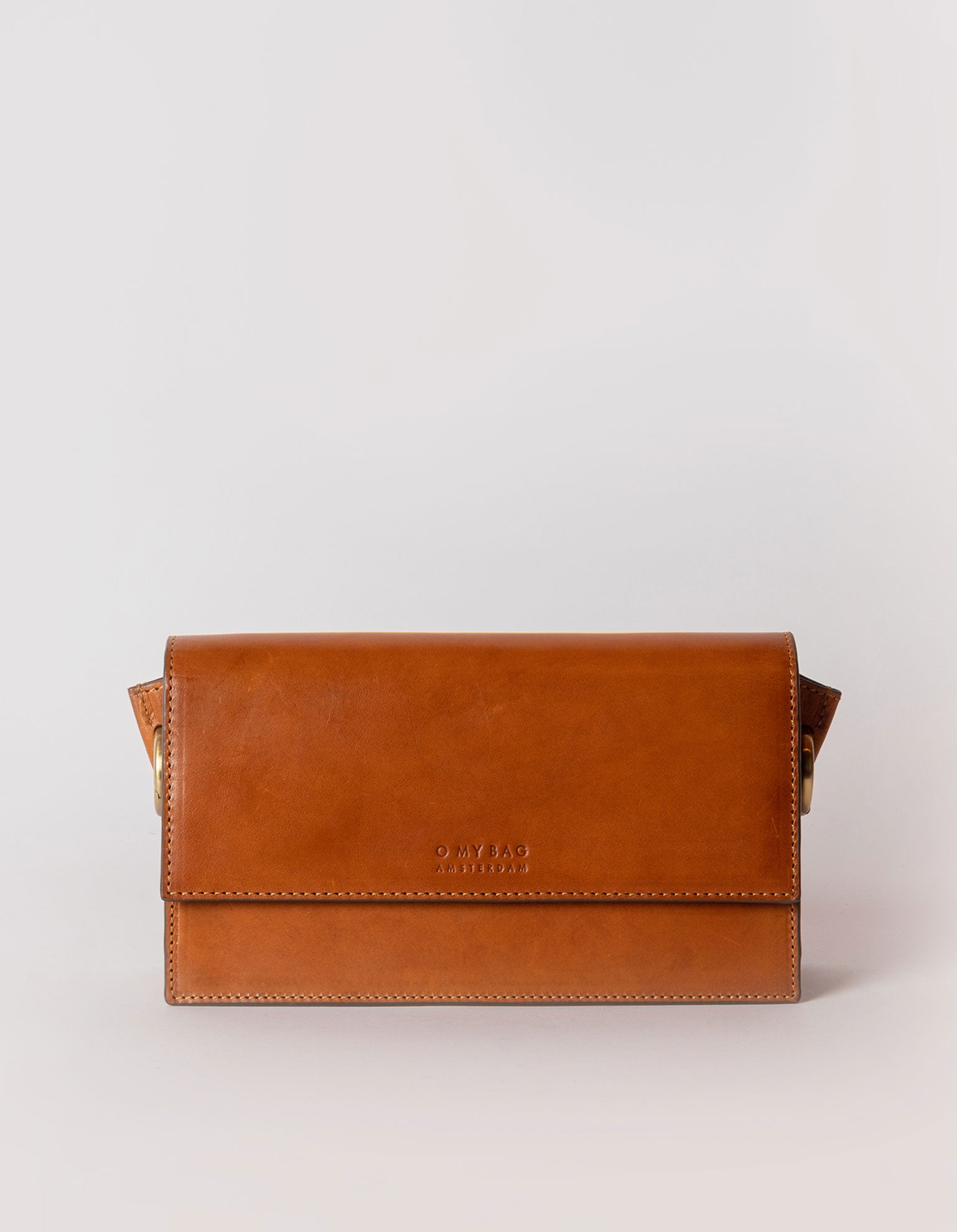 Stella in cognac classic leather without strap. Front product image.