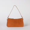 Taylor baguette bag in cognac - front product image