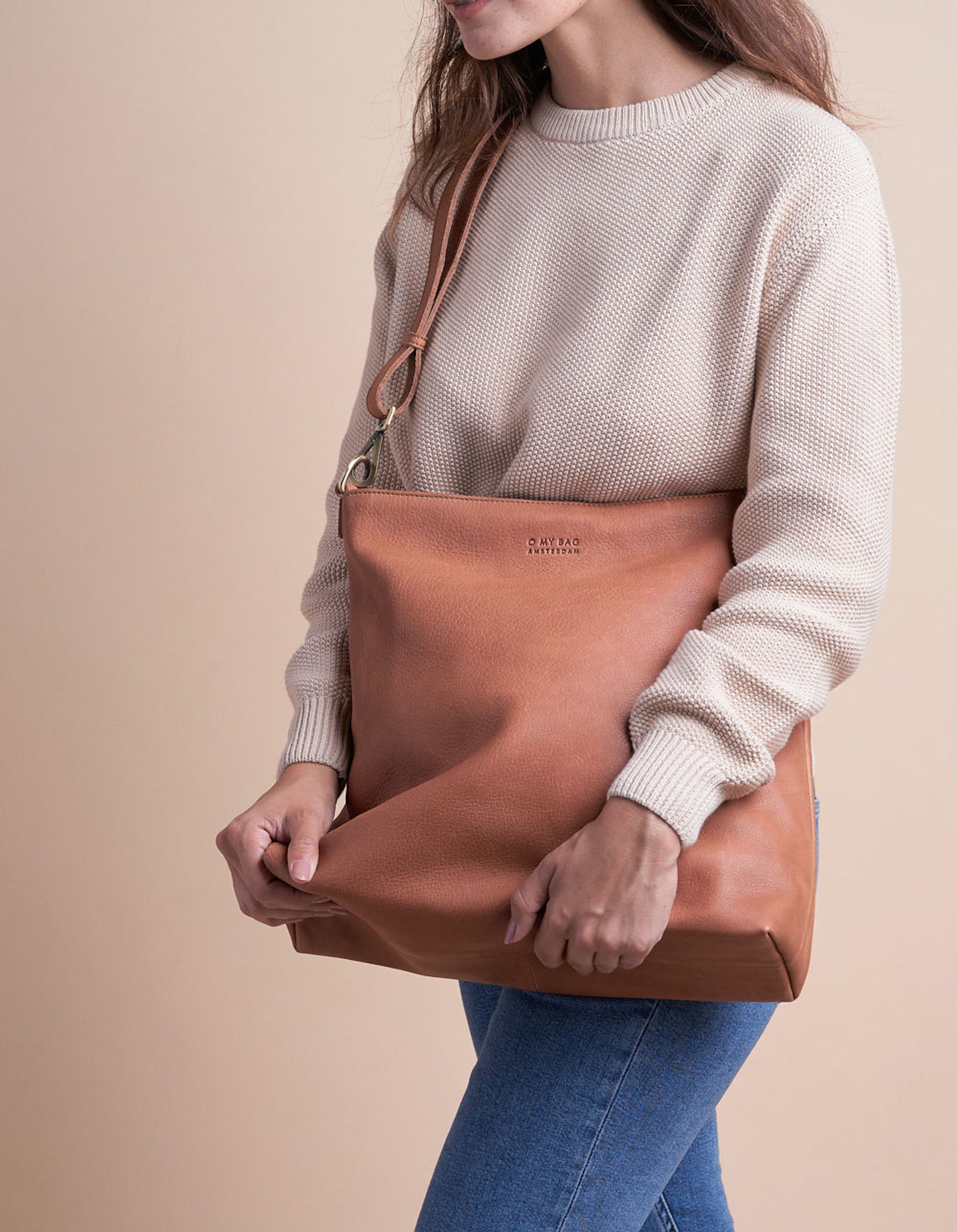 Wild Oak Leather shopper bag. Square shape with an adjustable and removable strap. Model product image.