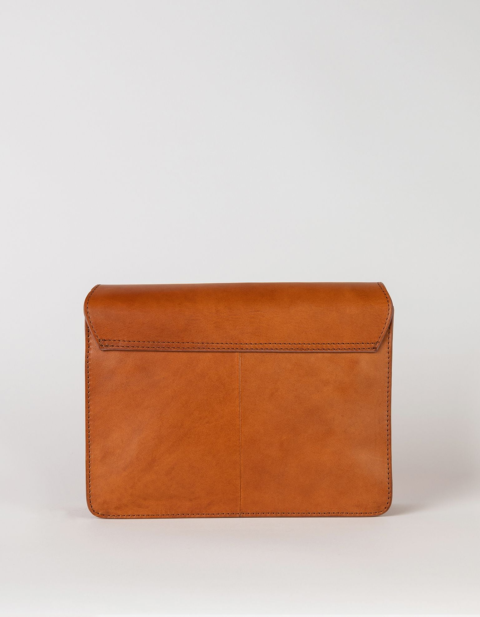 Audrey crossbody bag in cognac classic leather. Back product image.