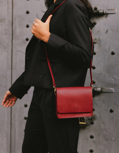 Ruby Leather womens handbag. Square shape with an adjustable strap. Lifestyle product image