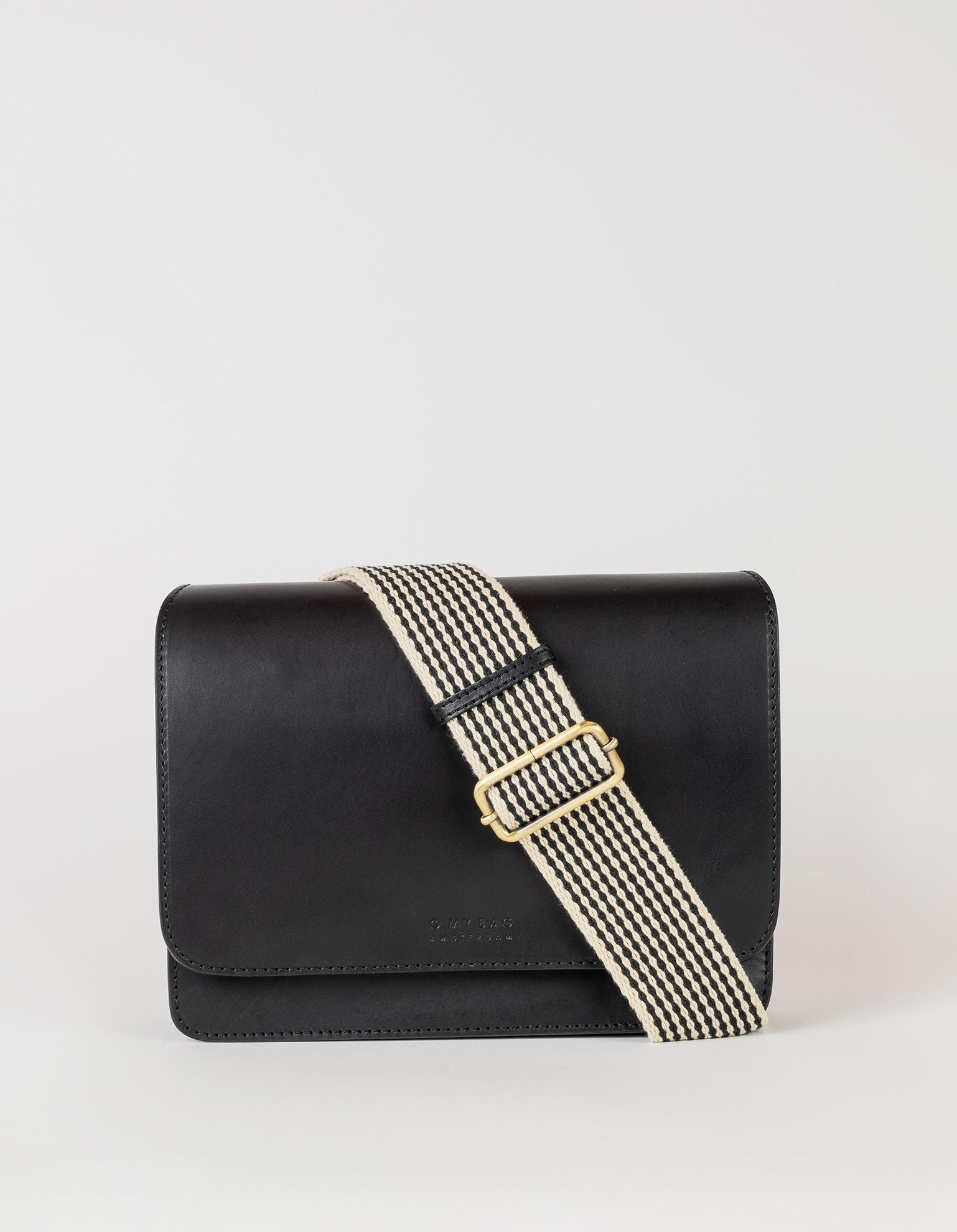 Audrey black classic leather bag. With webbing strap. Front product image.
