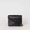 Audrey mini black classic leather bag. Front product image. With adjustable leather strap