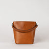 Small Cognac Bucket bag. Removable short strap. Front product image