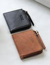 Small Black Classic Leather coin purse. Square shape. Lifestyle image