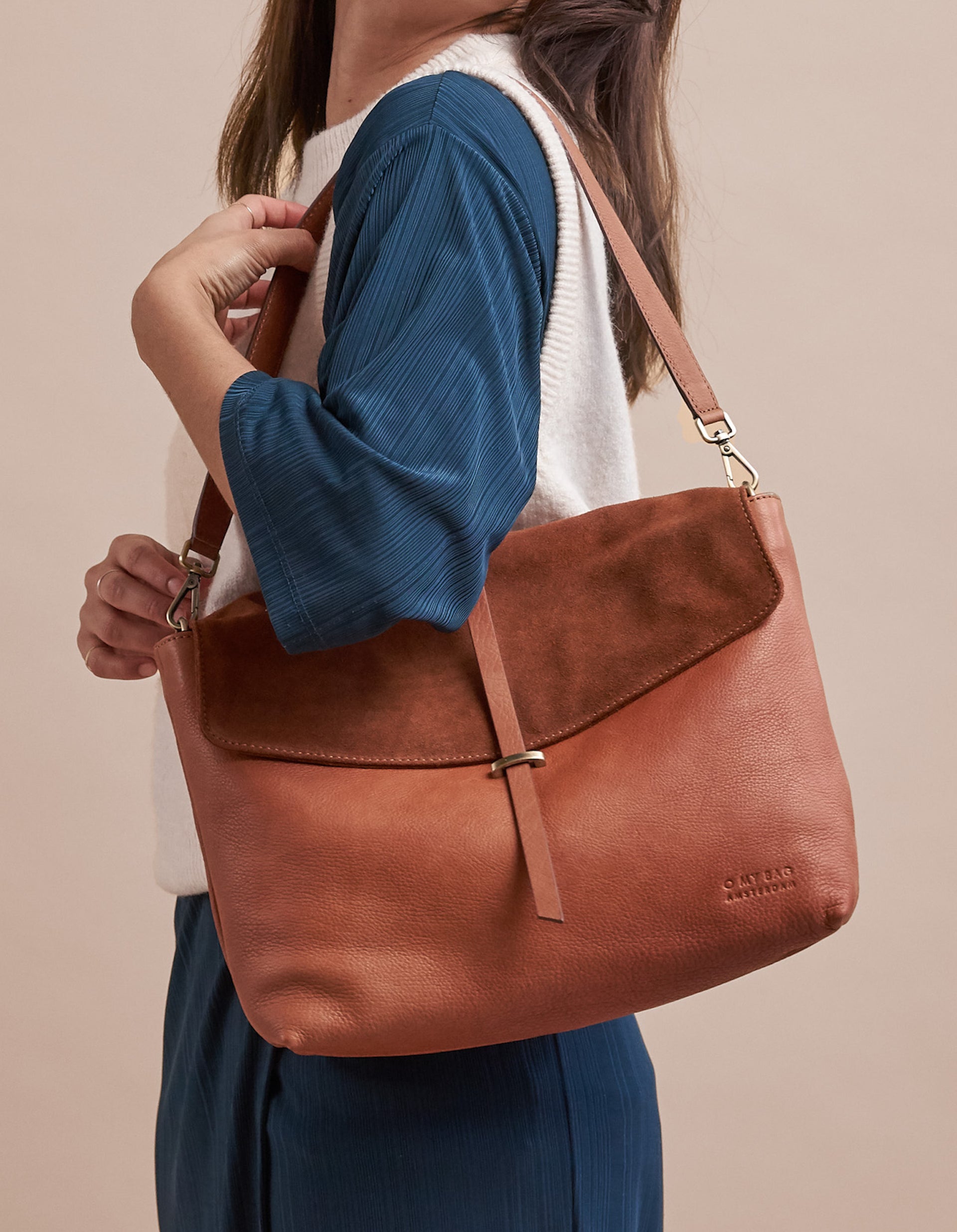 Wild Oak Soft Grain & Suede leather womens handbag. Square shape with short adjustable strap. Model product image.