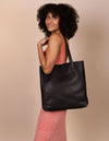 Georgia - Black Leather shopper bag. Female product image. Side view