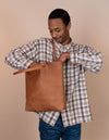 Camel Leather womens shopper bag. Square shape. Model product image.