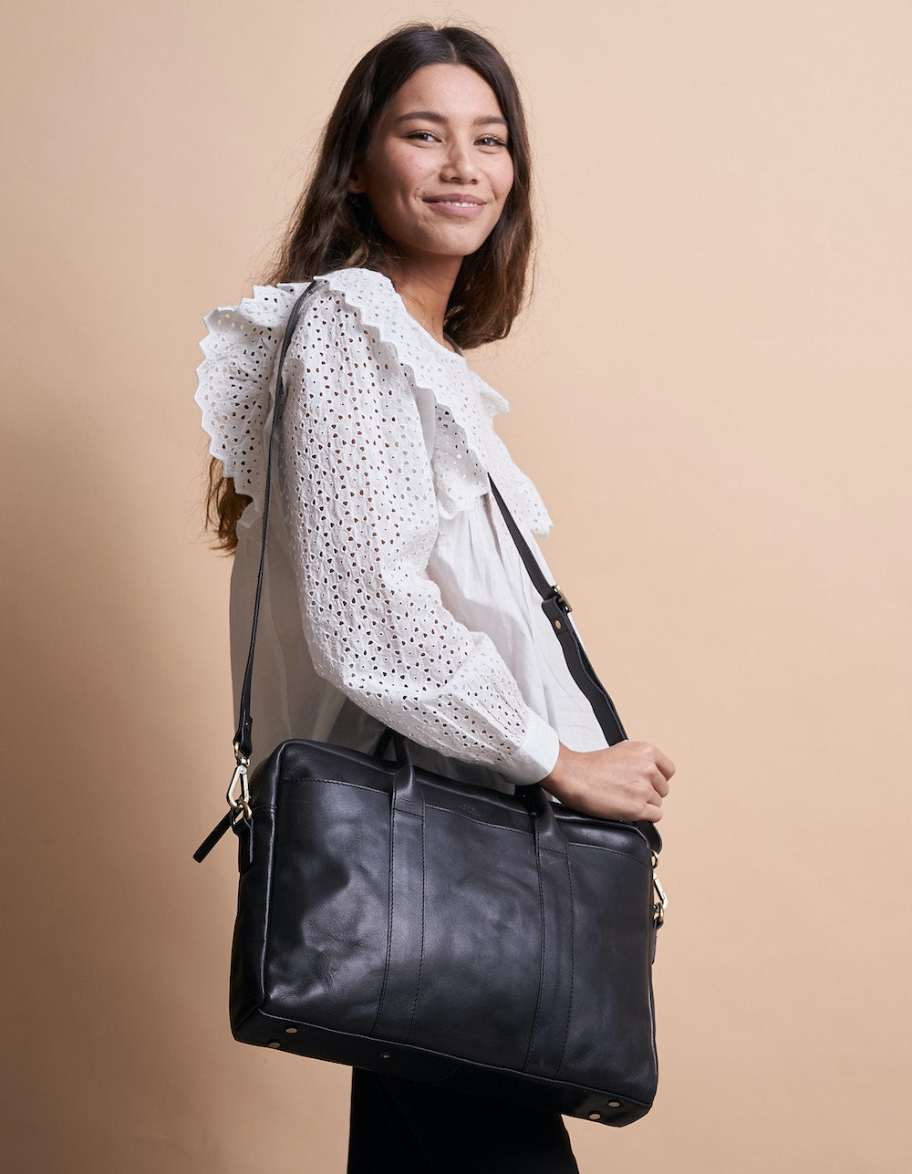 Black Leather business bag. Model product image.