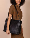 Olivia Black Leather Stromboli Leather, female model image
